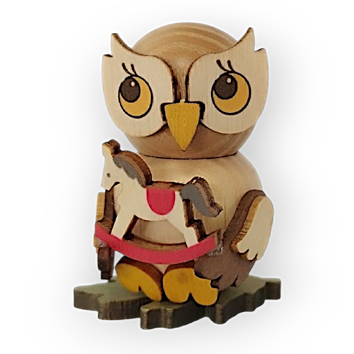 Owl child with rocking horse