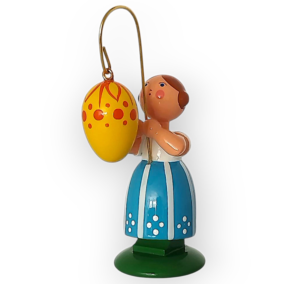 Easter girl with yellow egg