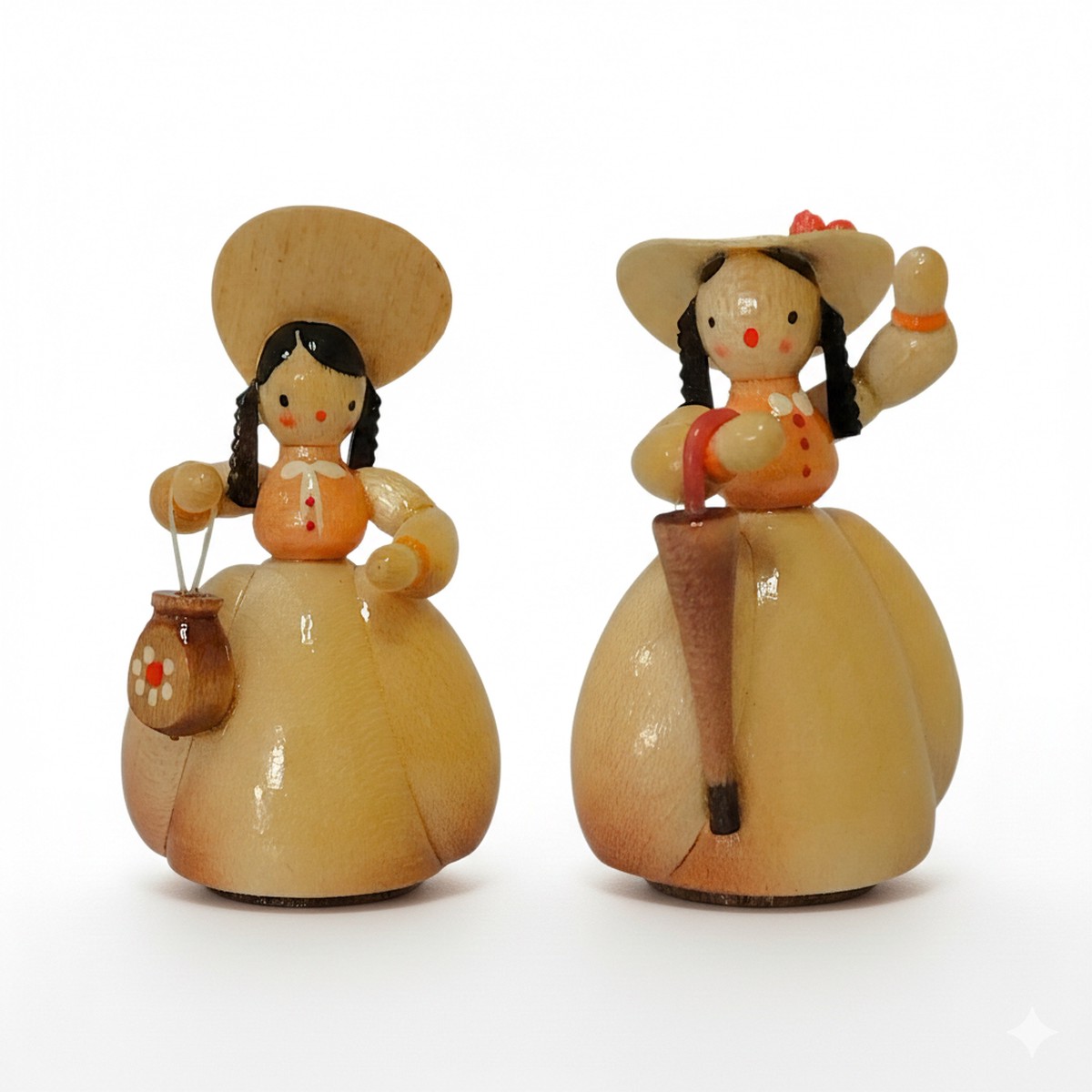 Ladies in Biedermeier style wearing hats